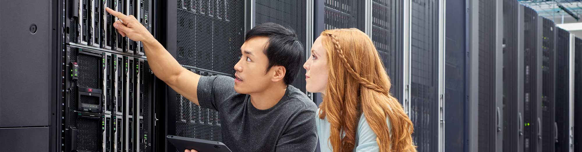 man pointing and showing server to lady