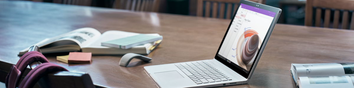 microsoft laptop opened on a desk